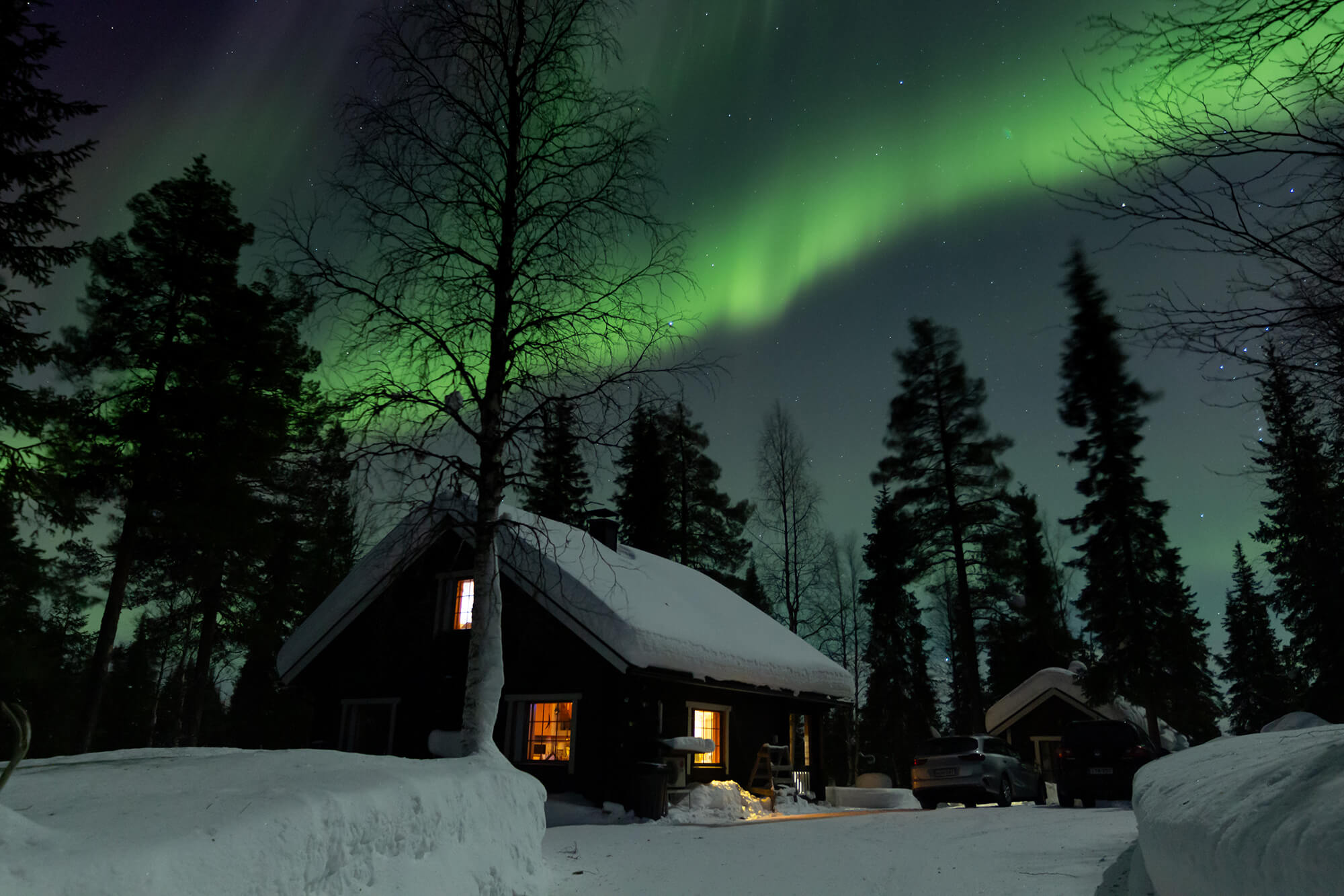Alleinreisende Blockhausurlaub Nordlichter Online Tour Finnisch Lappland Ferienhaus in Lappland